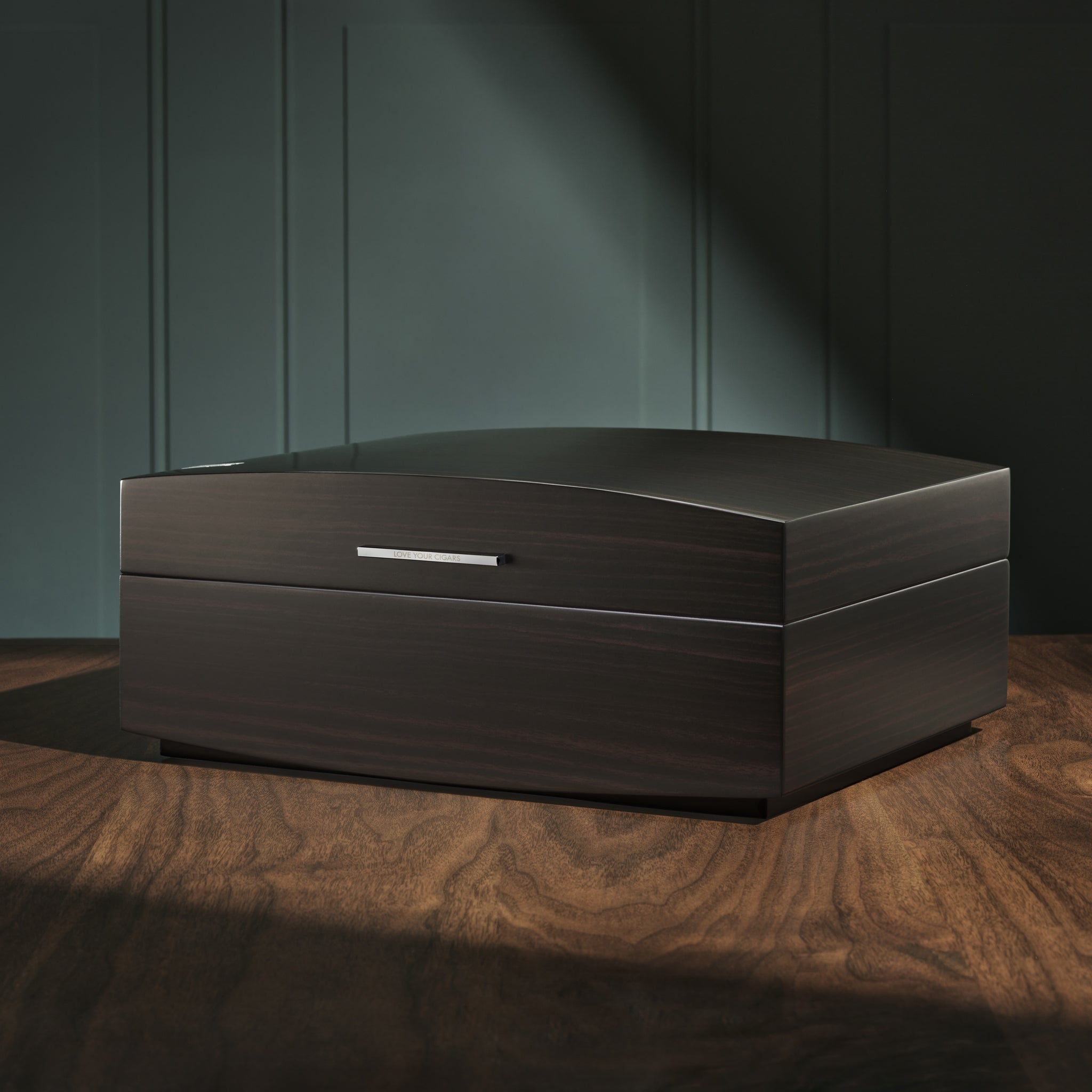Right side of a Boveda Humidor displayed on a wood table