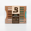 Boveda wooden holder for four packs.