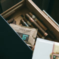 Boveda size 60 in a humidor drawer.